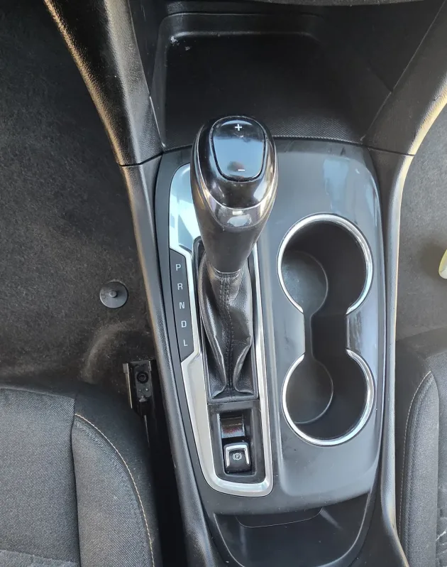 Clean car center console and cupholders after detailing